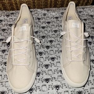 Beige Keds with cloth shoe bag